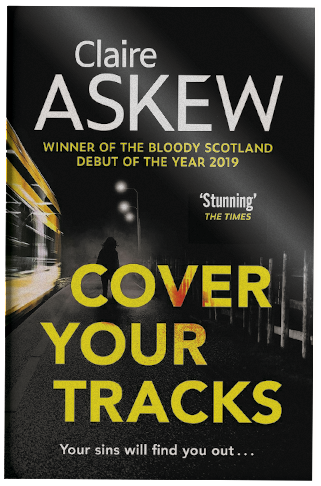 The cover of Cover Your Tracks shows a silhouetted female figure standing on station platform as the lights of a high speed train pass by.
